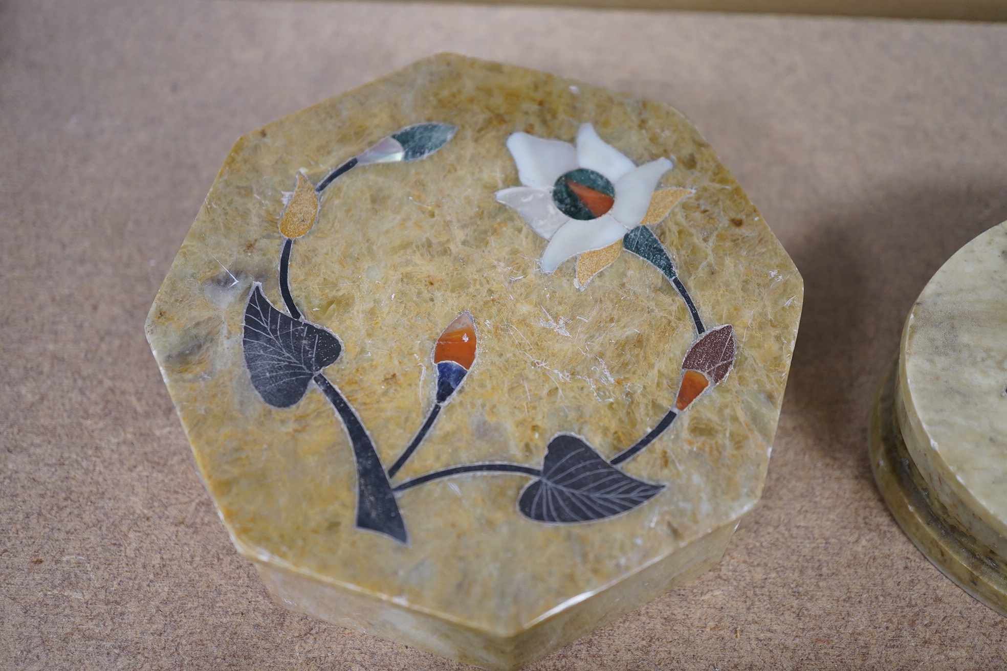 A group of assorted Indian soap stone pietra dura floral inlaid boxes, largest 10.5cm wide. Condition - good